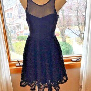 Designer Little black dress by Milly knee length with lace overlay